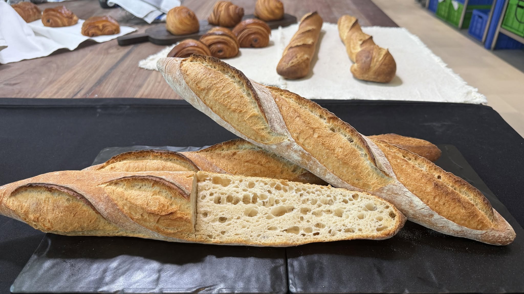 Freshly baked sourdough baguettes and croissants by Sang Moon Bakehouse